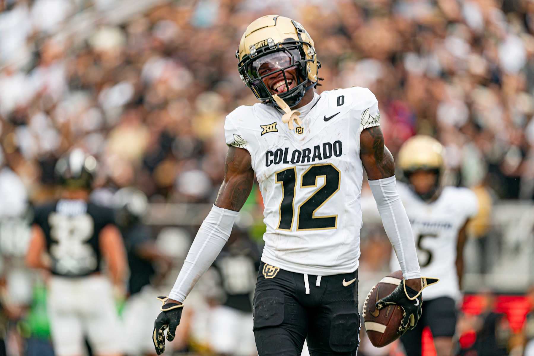ORLANDO, FL - SEPTEMBER 28:Colorado Buffaloes wide receiver Travis Hunter (12) smiles after a touchdown during a college football game between the Colorado Buffaloes and the UCF Knights on September 28th, 2024 at FBC Mortgage Stadium in Orlando, FL. (Photo by Chris Leduc/Icon Sportswire via Getty Images)