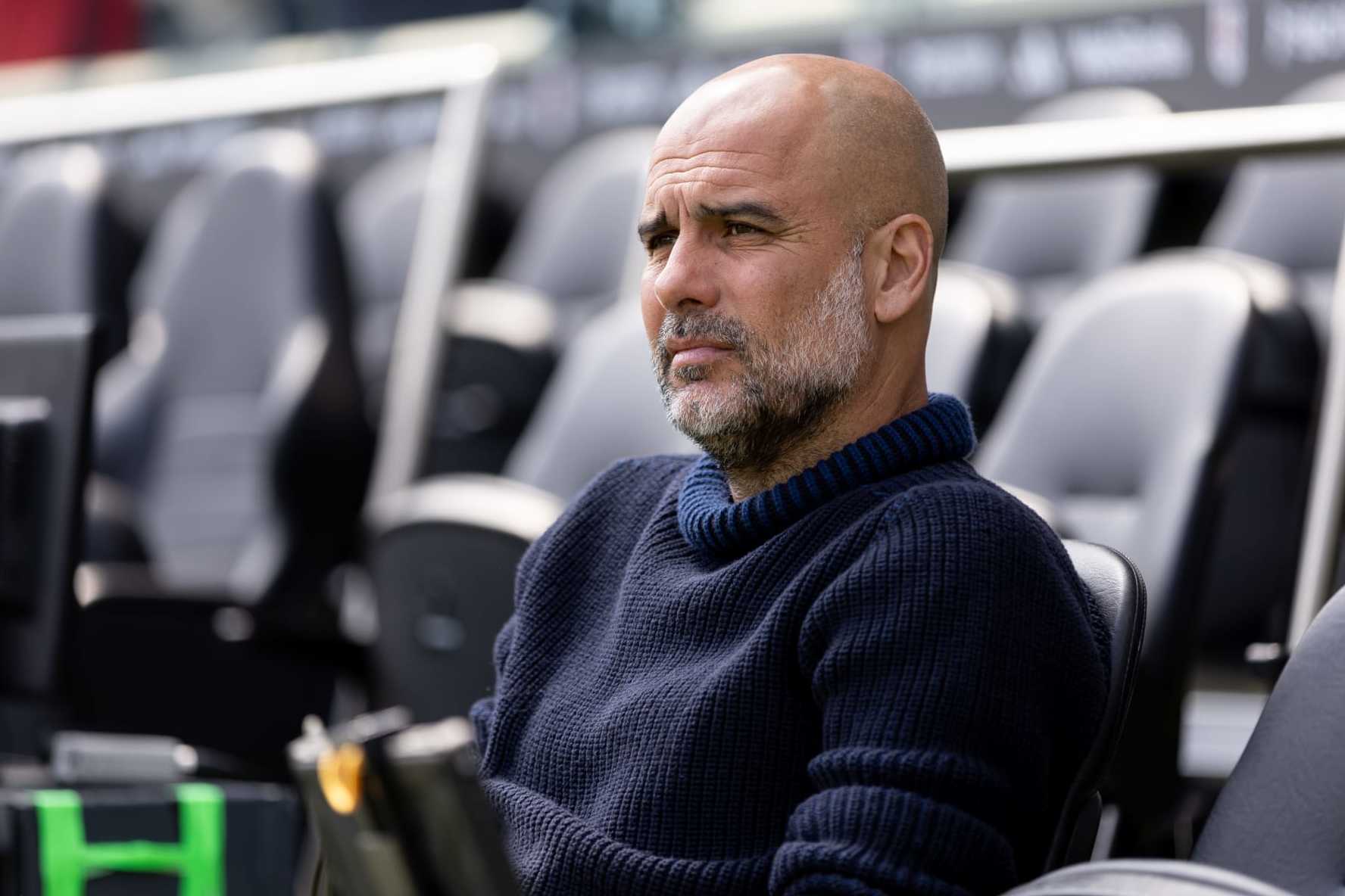 LONDON, ENGLAND - MAY 11: Josep Guardiola manager of Manchester City looks on prior to the Premier League match between Fulham FC and Manchester City at Craven Cottage on May 11, 2024 in London, England.(Photo by Gaspafotos/MB Media/Getty Images)