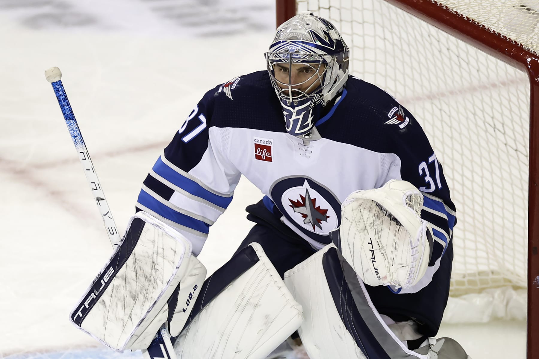 Winnipeg Jets goaltender Connor Hellebuyck (37) defends against the Unusual York Rangers within the third duration of an NHL hockey sport Monday, Feb. 20, 2023, in Unusual York. The Jets gained 4-1. (AP Photograph/Adam Starvation)