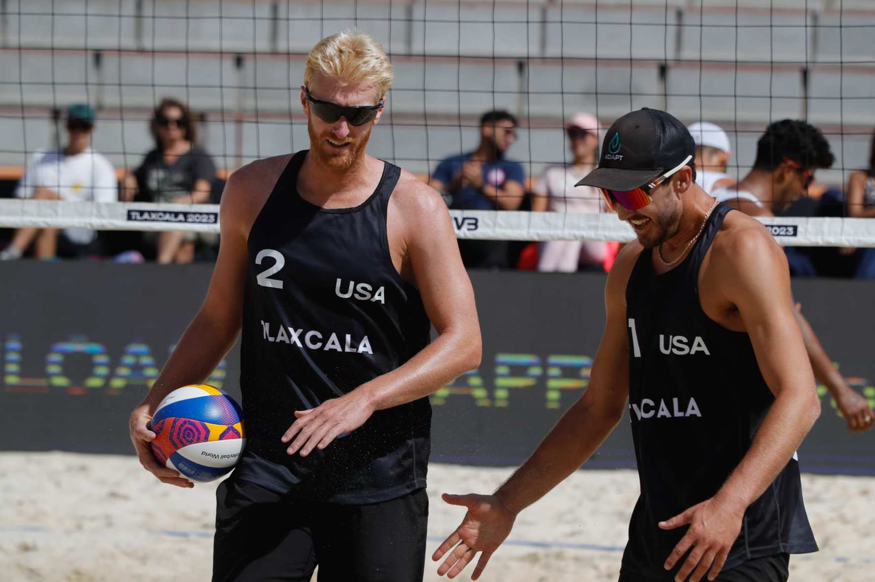 October 10, 2023, Tlaxcala, Mexico: Chase Budinger (L) and Miles Evans of  United States competes against team Mexico during the Beach Volleyball World Cup Men's match between USA and Mexico. (Photo by Essene Hernandez/ Eyepix Group) (Photo credit should read Essene Hernandez/ Eyepix Group/Future Publishing via Getty Images)
