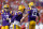 TAMPA, FLORIDA - JANUARY 01: Garrett Nussmeier #13 of the LSU Tigers congratulates John Emery Jr. #4 after a touchdown during the ReliaQuest Bowl against the Wisconsin Badgers at Raymond James Stadium on January 01, 2024 in Tampa, Florida. (Photo by Mike Ehrmann/Getty Images)