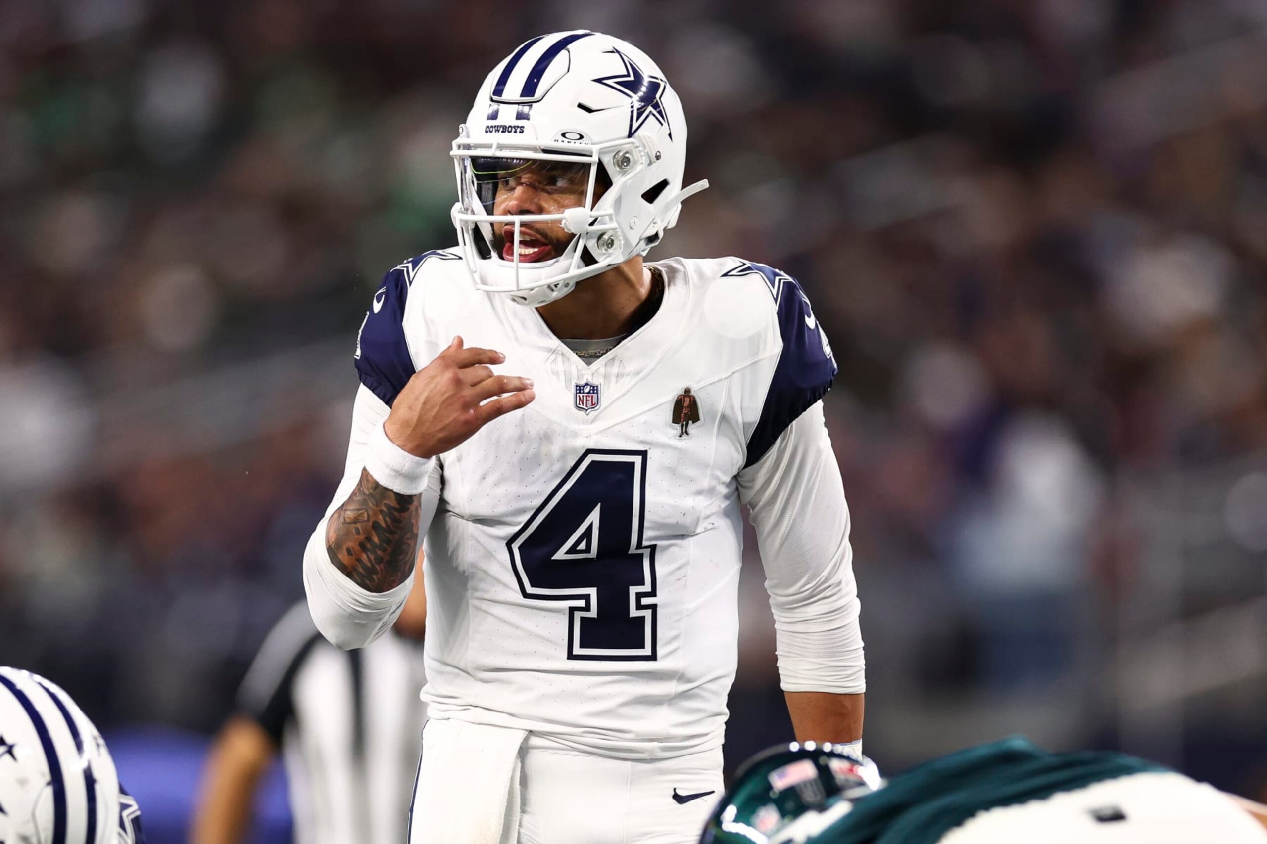 ARLINGTON, TX - DECEMBER 10: Dak Prescott #4 of the Dallas Cowboys calls a play at the line of scrimmage during an NFL football game against the Philadelphia Eagles at AT&T Stadium on December 10, 2023 in Arlington, Texas. (Photo by Kevin Sabitus/Getty Images) ARLINGTON, TX - DECEMBER 10: Dak Prescott #4 of the Dallas Cowboys calls a play at the line of scrimmage during an NFL football game against the Philadelphia Eagles at AT&T Stadium on December 10, 2023 in Arlington, Texas. (Photo by Kevin Sabitus/Getty Images)