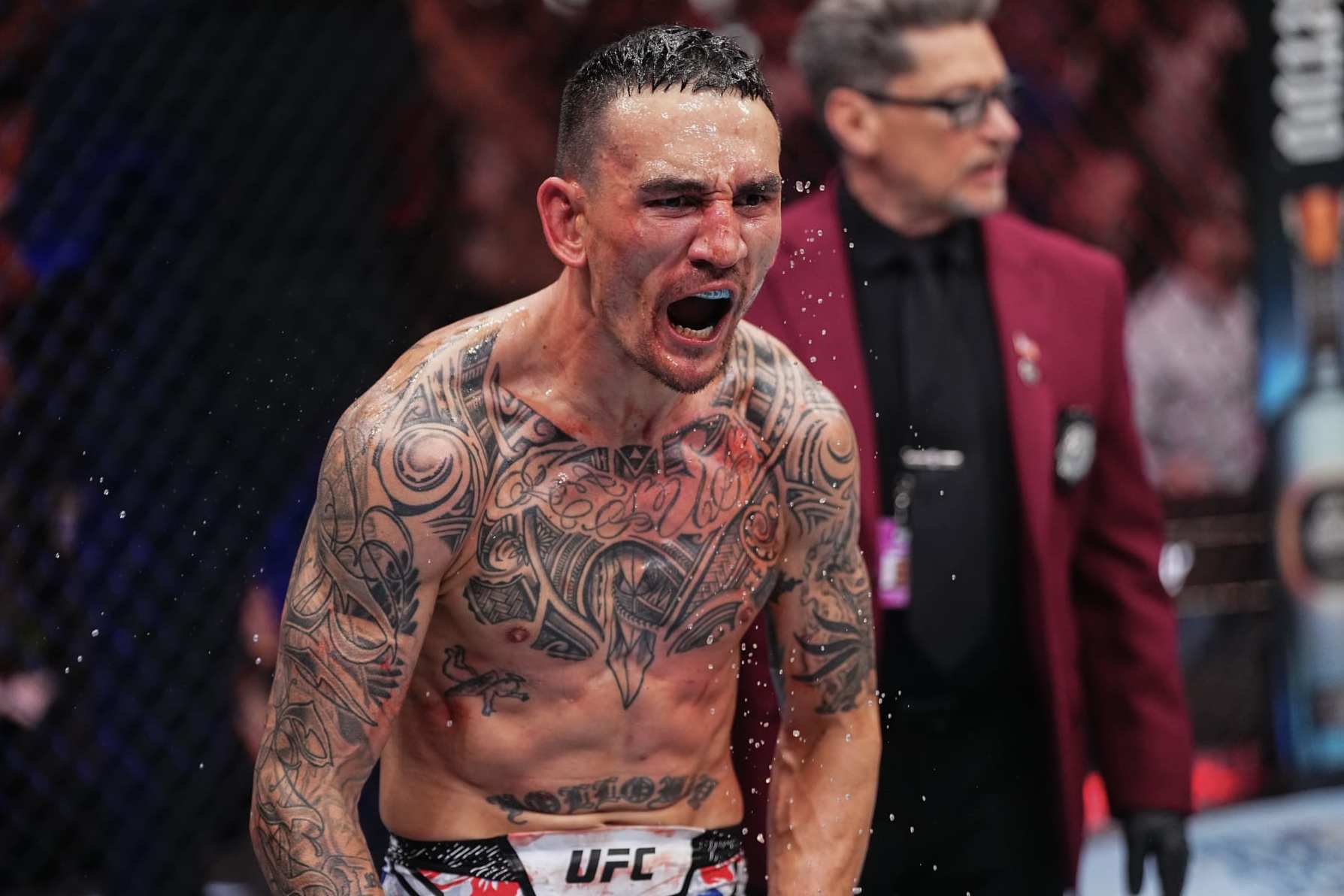 LAS VEGAS, NEVADA - APRIL 13: Max Holloway reacts to the knockout of Justin Gaethje in the BMF championship fight during the UFC 300 event at T-Mobile Arena on April 13, 2024 in Las Vegas, Nevada. (Photo by Jeff Bottari/Zuffa LLC via Getty Images)