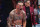 LAS VEGAS, NEVADA - APRIL 13: Max Holloway reacts to the knockout of Justin Gaethje in the BMF championship fight during the UFC 300 event at T-Mobile Arena on April 13, 2024 in Las Vegas, Nevada. (Photo by Jeff Bottari/Zuffa LLC via Getty Images)