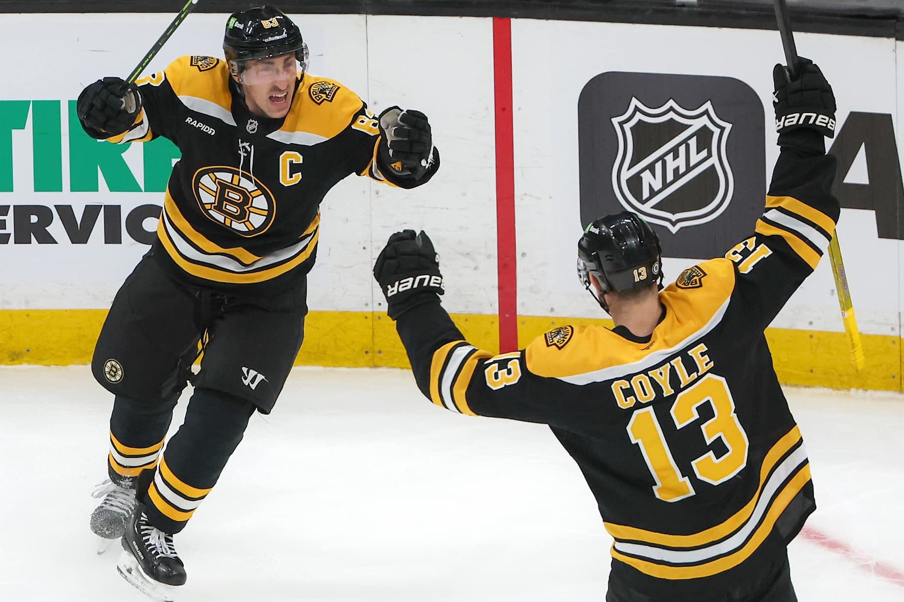 Boston, MA - December 23: Boston Bruins C Charlie Coyle celebrates his goal with teammate Brad Marchand in the third period. (Photo by Matthew J. Lee/The Boston Globe via Getty Images)