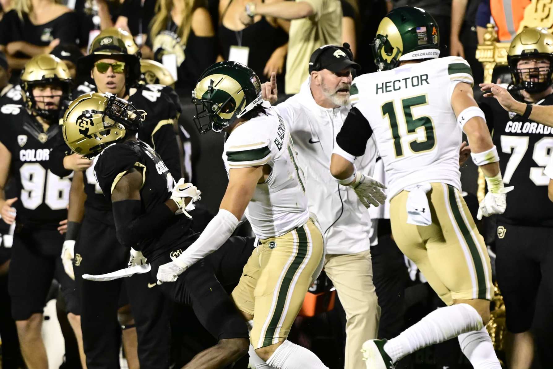 BOULDER, CO - SEPTEMBER 16: Colorado Buffaloes cornerback Travis Hunter (12) gets hit by Colorado State Rams defensive back Henry Blackburn (11) in the first quarter during the Rocky Mountain Showdown at Folsom Field September 16, 2023. Hunter was injured on the play, but returned to the game. (Photo by Andy Cross/The Denver Post)