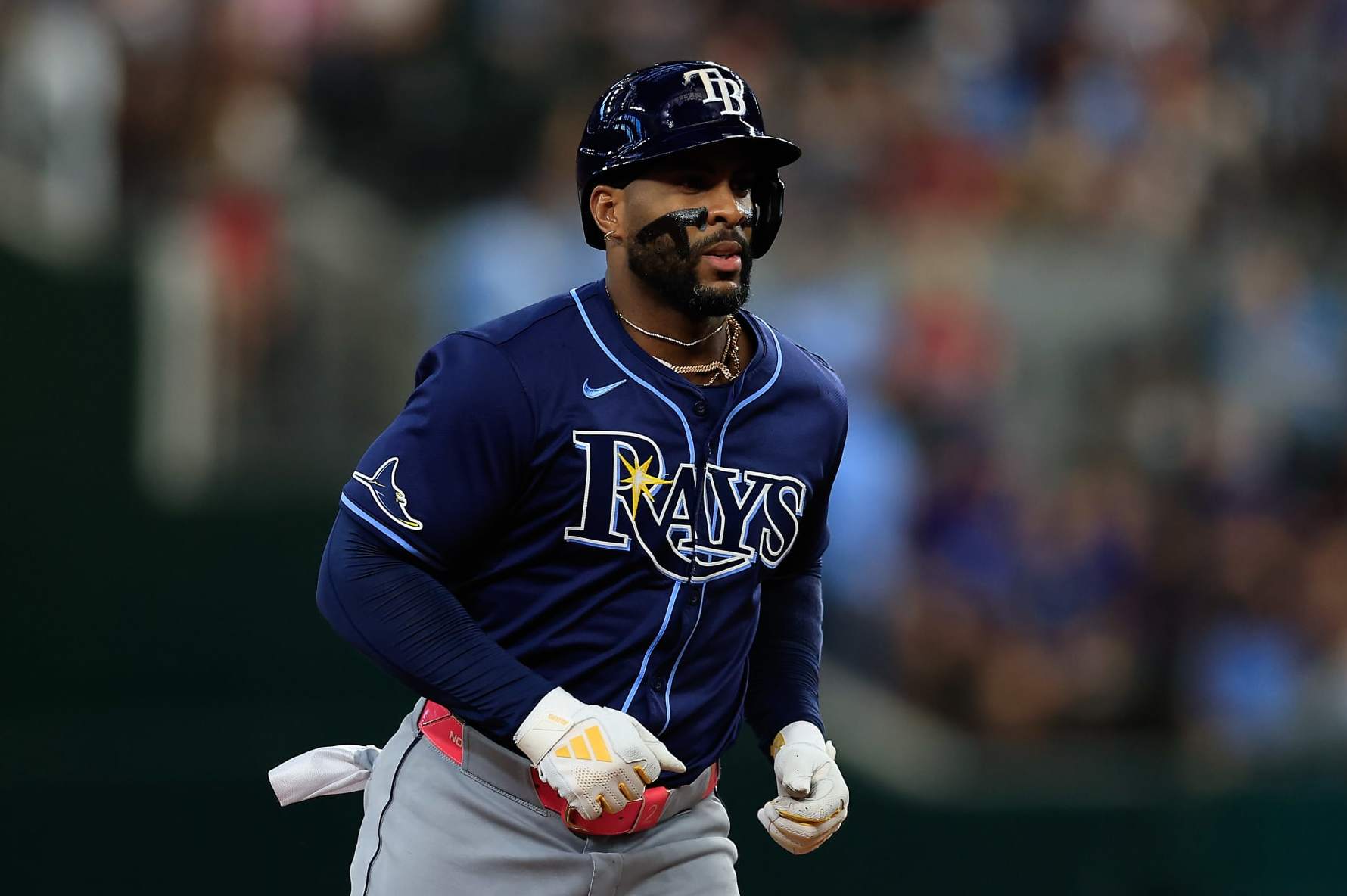 ARLINGTON, TEXAS - JULY 06: Yandy Díaz #2 of the Tampa Bay Rays rounds the bases after hitting a three run home run against the Texas Rangers in the seventh inning at Globe Life Field on July 06, 2024 in Arlington, Texas. (Photo by Buda Mendes/Getty Images)