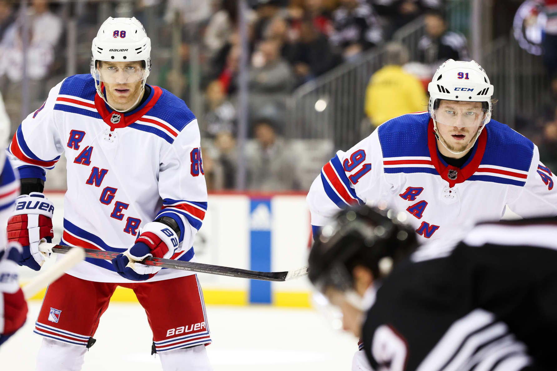 NEWARK, NJ - MARCH 30: New York Rangers right wing Patrick Kane (88) and New York Rangers right wing Vladimir Tarasenko (91) look on during the National Hockey League game between the New York Rangers and the New Jersey Devils on March 30, 2023 at Prudential Center in Newark, NJ. (Photo by Andrew Mordzynski/Icon Sportswire via Getty Images)