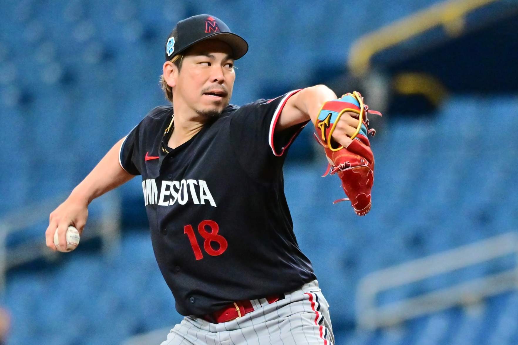 ST PETERSBURG, FLORIDA - MARCH 02: Kenta Maeda #18 of the Minnesota Twins delivers a pitch to the Tampa Bay Rays in the first inning during a Grapefruit League Spring Training game at Tropicana Field on March 02, 2023 in St Petersburg, Florida. (Photo by Julio Aguilar/Getty Images)