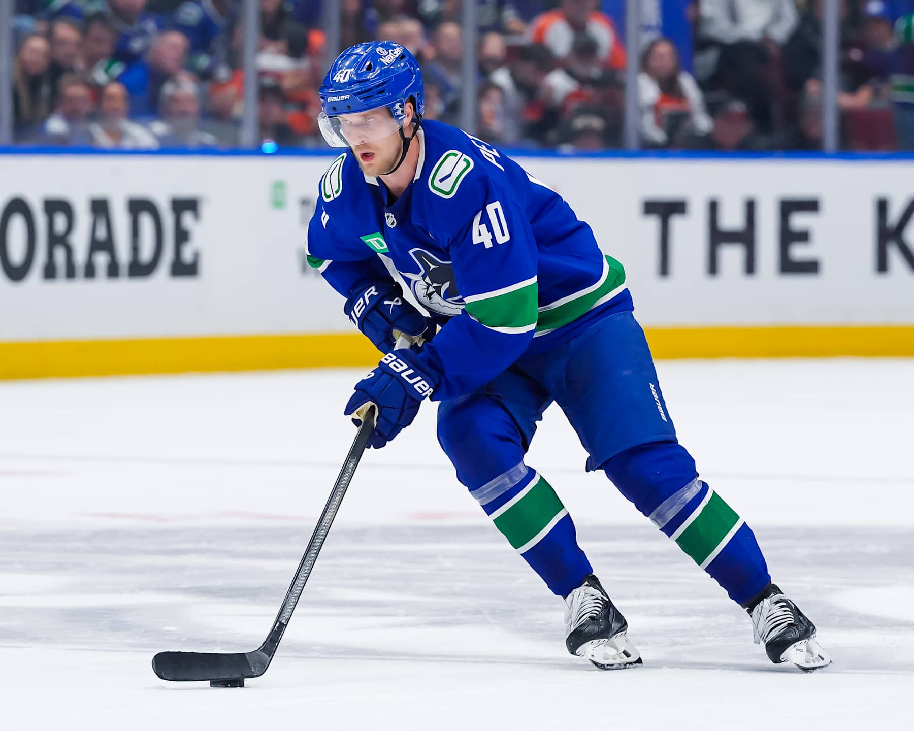 VANCOUVER, CANADA - OCTOBER 11: Elias Pettersson #40 of the Vancouver Canucks skates with the puck during the shootout in their NHL game against the Philadelphia Flyers at Rogers Arena on October 11, 2024 in Vancouver, British Columbia, Canada. (Photo by Derek Cain/Getty Images)