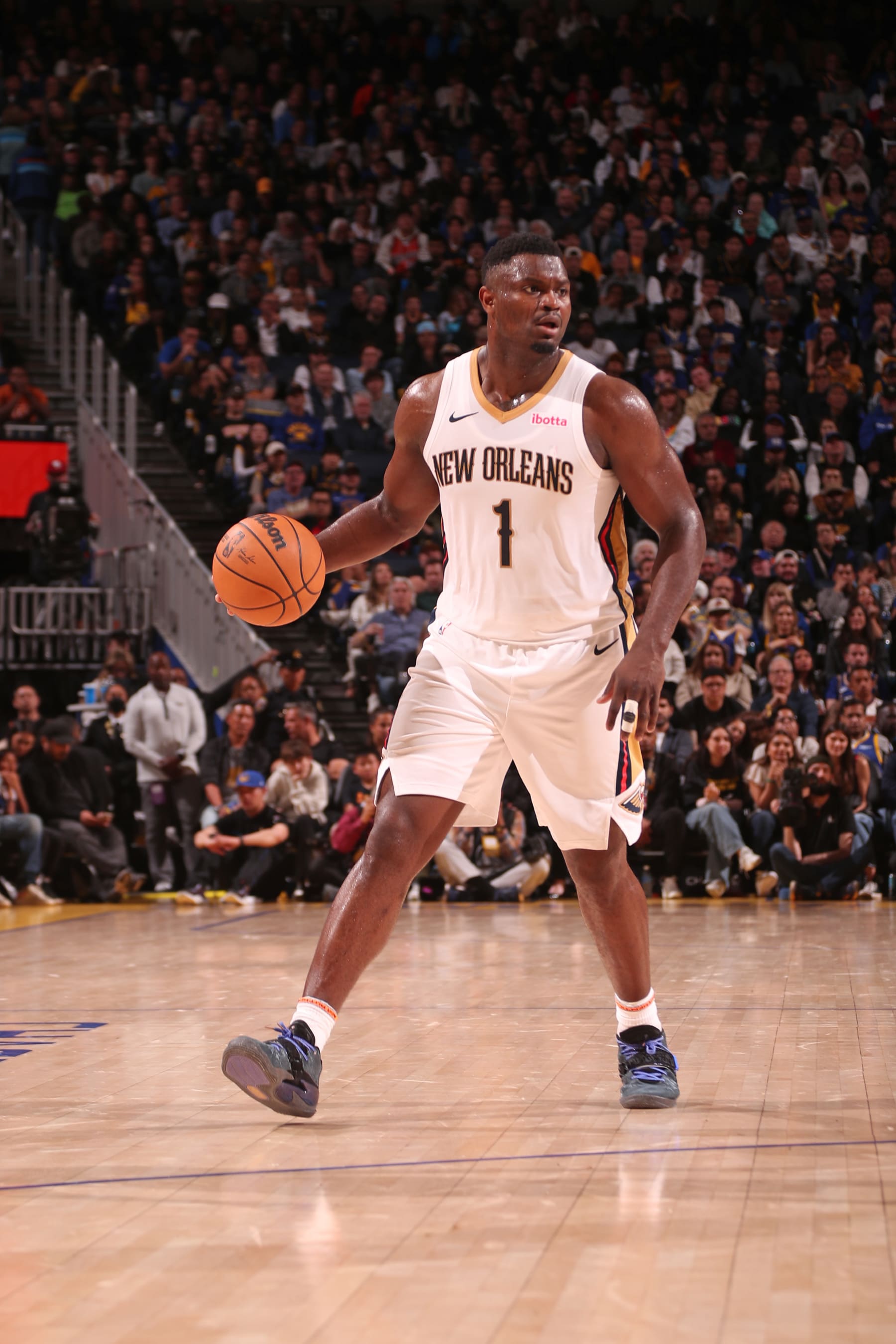 SAN FRANCISCO, CA - APRIL 12: Zion Williamson #1 of the New Orleans Pelicans dribbles the ball during the game against the Golden State Warriors on April 12, 2024 at Chase Center in San Francisco, California. NOTE TO USER: User expressly acknowledges and agrees that, by downloading and or using this photograph, user is consenting to the terms and conditions of Getty Images License Agreement. Mandatory Copyright Notice: Copyright 2024 NBAE (Photo by Jed Jacobsohn/NBAE via Getty Images)
