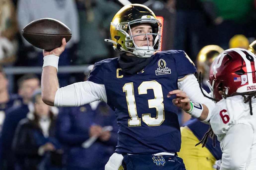 SOUTH BEND, INDIANA - DECEMBER 20: Riley Leonard #13 of the Notre Dame Fighting Irish passes the ball during a game between the Indiana Hoosiers and the Notre Dame Fighting Irish at Notre Dame Stadium on December 20, 2024 in South Bend, Indiana. (Photo by Steve Limentani/ISI Photos/Getty Images)