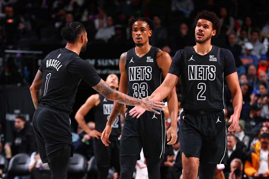 BROOKLYN, NY - JANUARY 21: Cameron Johnson #2 and D'Angelo Russell #1 of the Brooklyn Nets high five during the game against the New York Knicks on January 21, 2025 at Barclays Center in Brooklyn, New York. NOTE TO USER: User expressly acknowledges and agrees that, by downloading and or using this Photograph, user is consenting to the terms and conditions of the Getty Images License Agreement. Mandatory Copyright Notice: Copyright 2025 NBAE (Photo by David L. Nemec/NBAE via Getty Images)