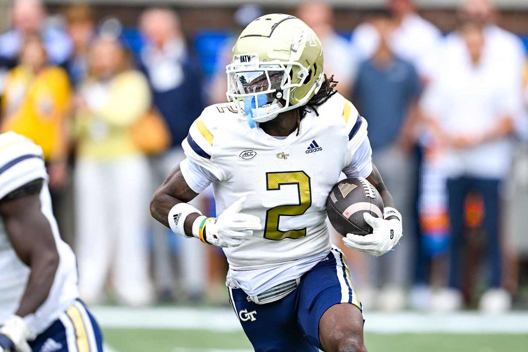 ATLANTA, GA NOVEMBER 09: Georgia Tech wide receiver Eric Singleton Jr. (2) runs with the ball during the college football game between the Miami Hurricanes and the Georgia Tech Yellow Jackets on November 9th, 2024 at Mercedes-Benz Stadium in Atlanta, GA. (Photo by Rich von Biberstein/Icon Sportswire via Getty Images)
