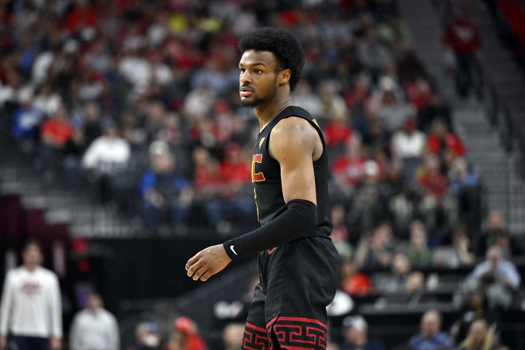 LAS VEGAS, NEVADA - MARCH 14: Bronny James #6 of the USC Trojans looks on in the second half of a quarterfinal game against the Arizona Wildcats during the Pac-12 Conference basketball tournament at T-Mobile Arena on March 14, 2024 in Las Vegas, Nevada. The Wildcats defeated the Trojans 70-49. (Photo by David Becker/Getty Images)