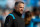 CHARLOTTE, NORTH CAROLINA - DECEMBER 26: Head coach Matt Rhule of the Carolina Panthers walks onto the field before the game against the Tampa Bay Buccaneers at Bank of America Stadium on December 26, 2021 in Charlotte, North Carolina. (Photo by Grant Halverson/Getty Images)
