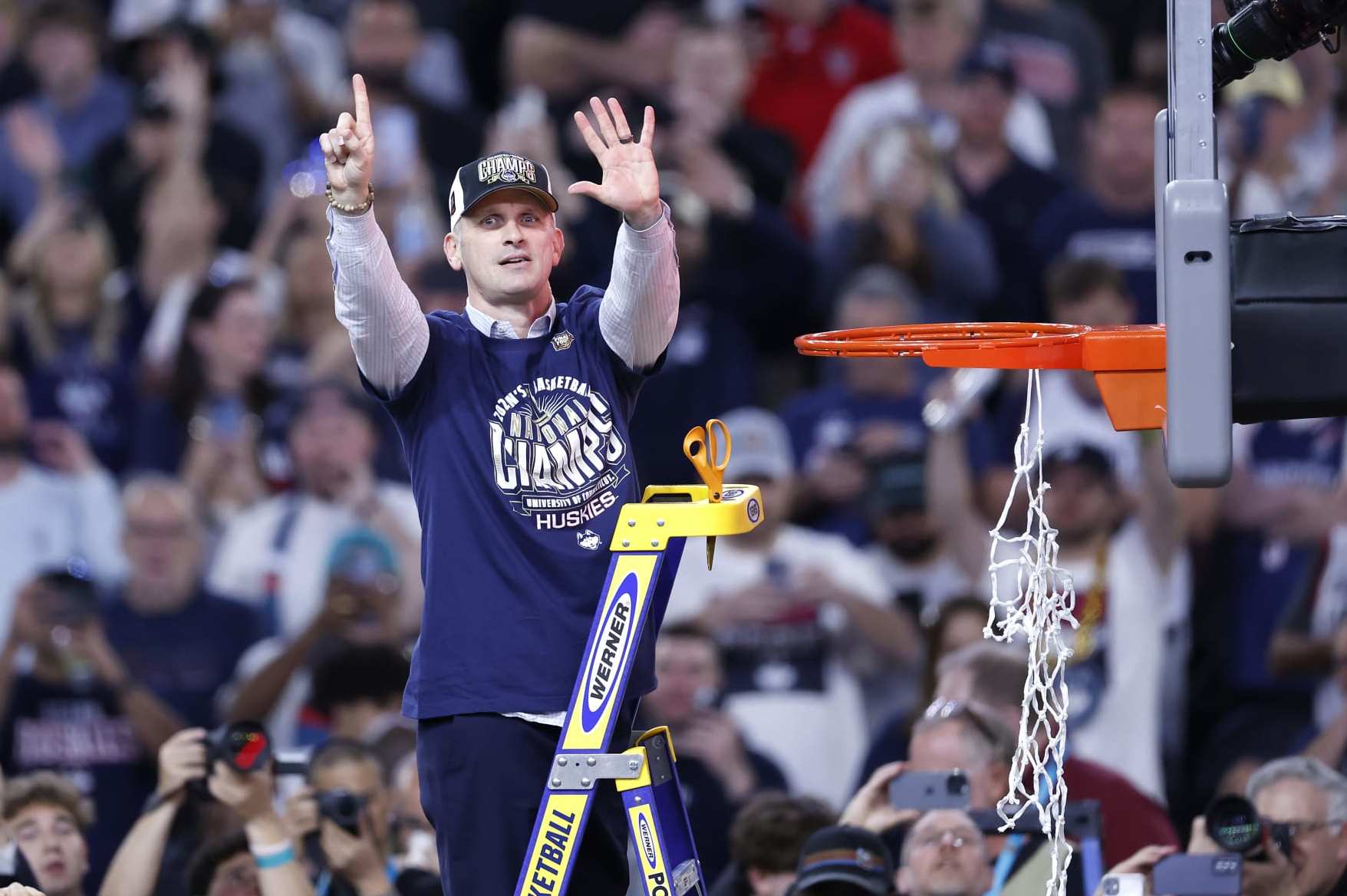 GLENDALE, ARIZONA - APRIL 08: Head coach Dan Hurley of the Connecticut Huskies cuts down the net after beating the Purdue Boilermakers 75-60 to win the NCAA Men's Basketball Tournament National Championship game at State Farm Stadium on April 08, 2024 in Glendale, Arizona. (Photo by Chris Coduto/Getty Images)