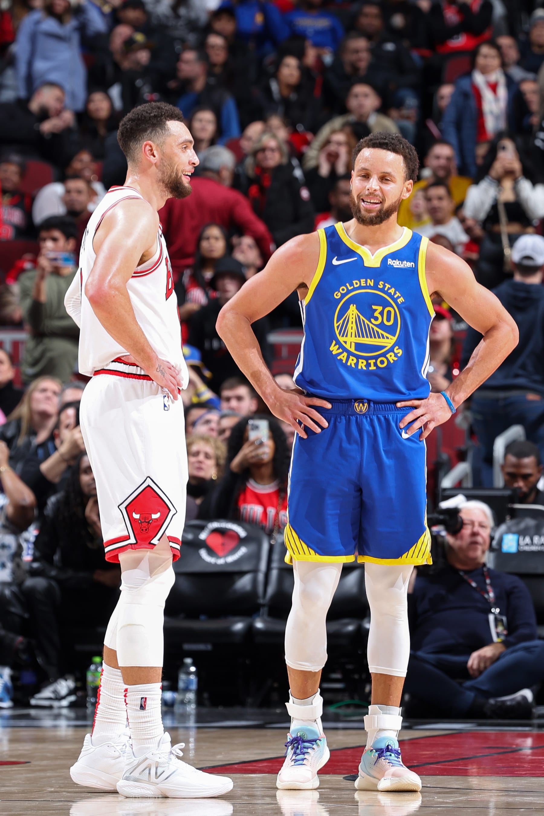 CHICAGO, IL - JANUARY 12: Zach LaVine #8 of the Chicago Bulls talks to Stephen Curry #30 of the Golden State Warriors during the game on January 12, 2024 at United Center in Chicago, Illinois. NOTE TO USER: User expressly acknowledges and agrees that, by downloading and or using this photograph, User is consenting to the terms and conditions of the Getty Images License Agreement. Mandatory Copyright Notice: Copyright 2024 NBAE (Photo by Jeff Haynes/NBAE via Getty Images)
