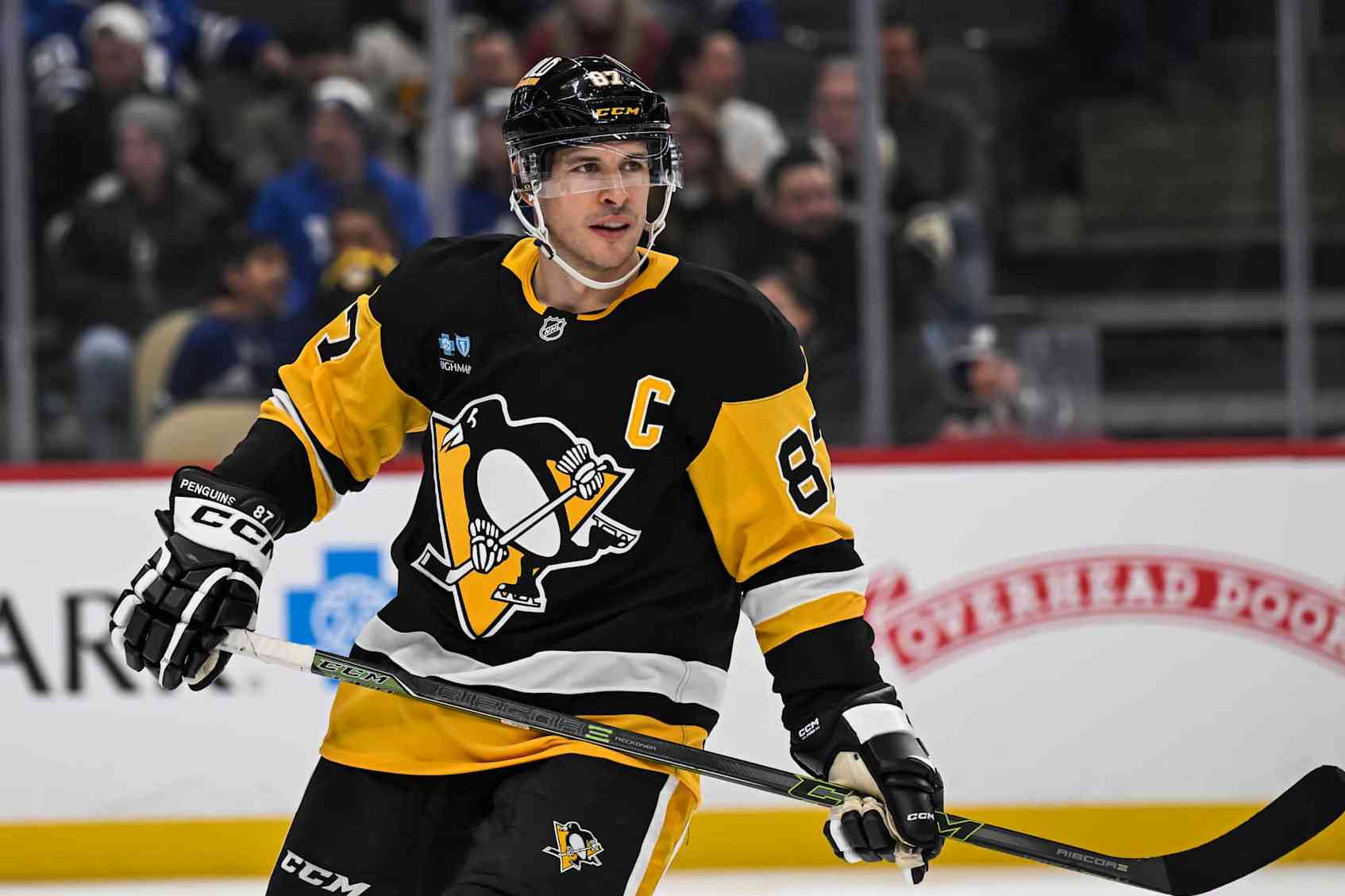 PITTSBURGH, PA - DECEMBER 07: Pittsburgh Penguins center Sidney Crosby (87) looks on during the second period in the NHL game between the Pittsburgh Penguins and the Toronto Maple Leafs on December 7, 2024, at PPG Paints Arena in Pittsburgh, PA. (Photo by Jeanine Leech/Icon Sportswire via Getty Images)