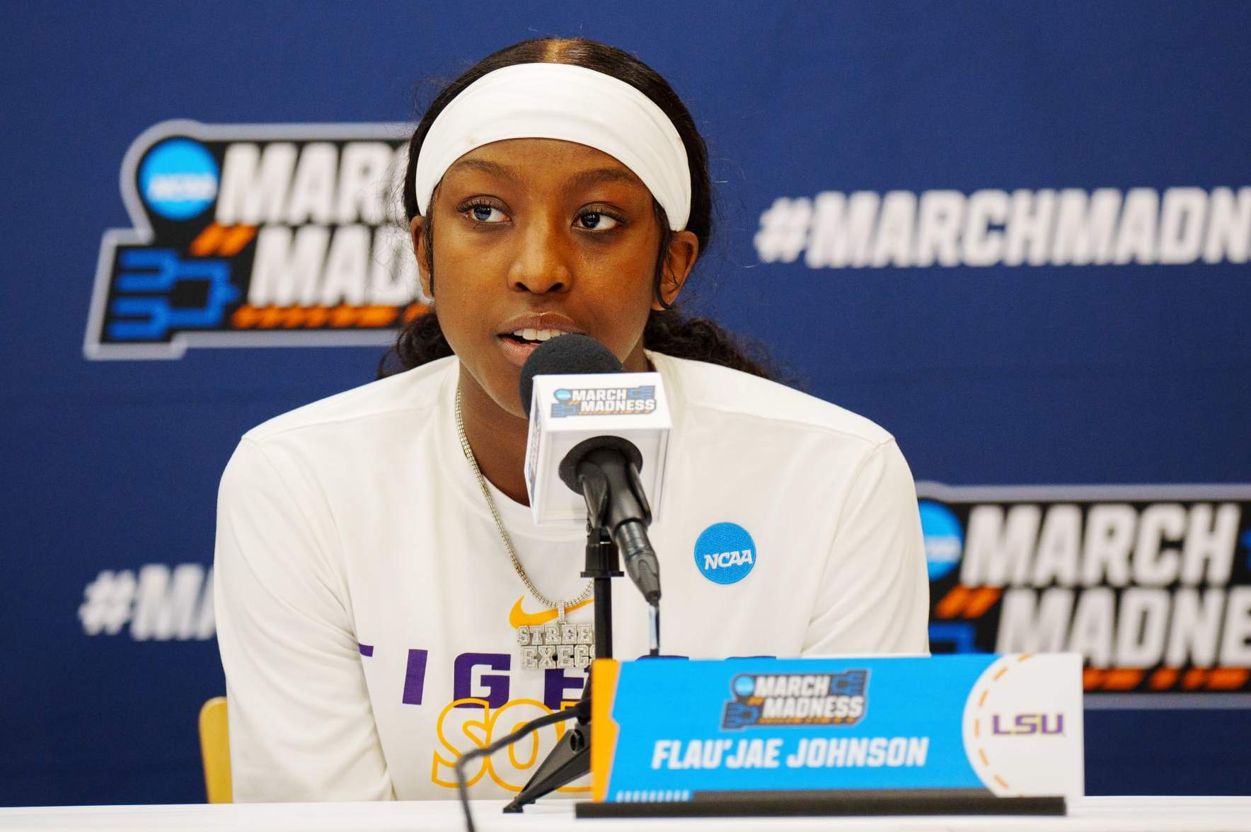 BATON ROUGE, LA - MARCH 17: Flaujae Johnson #4 of the LSU Lady Tigers talks to media during a press conference after the game against the Hawai'i Rainbow Wahine in the first round of the 2023 NCAA Women's Basketball Tournament held at the Pete Maravich Assembly Center on March 17, 2023 in Baton Rouge, Louisiana. (Photo by Rebecca Warren/NCAA Photos via Getty Images)