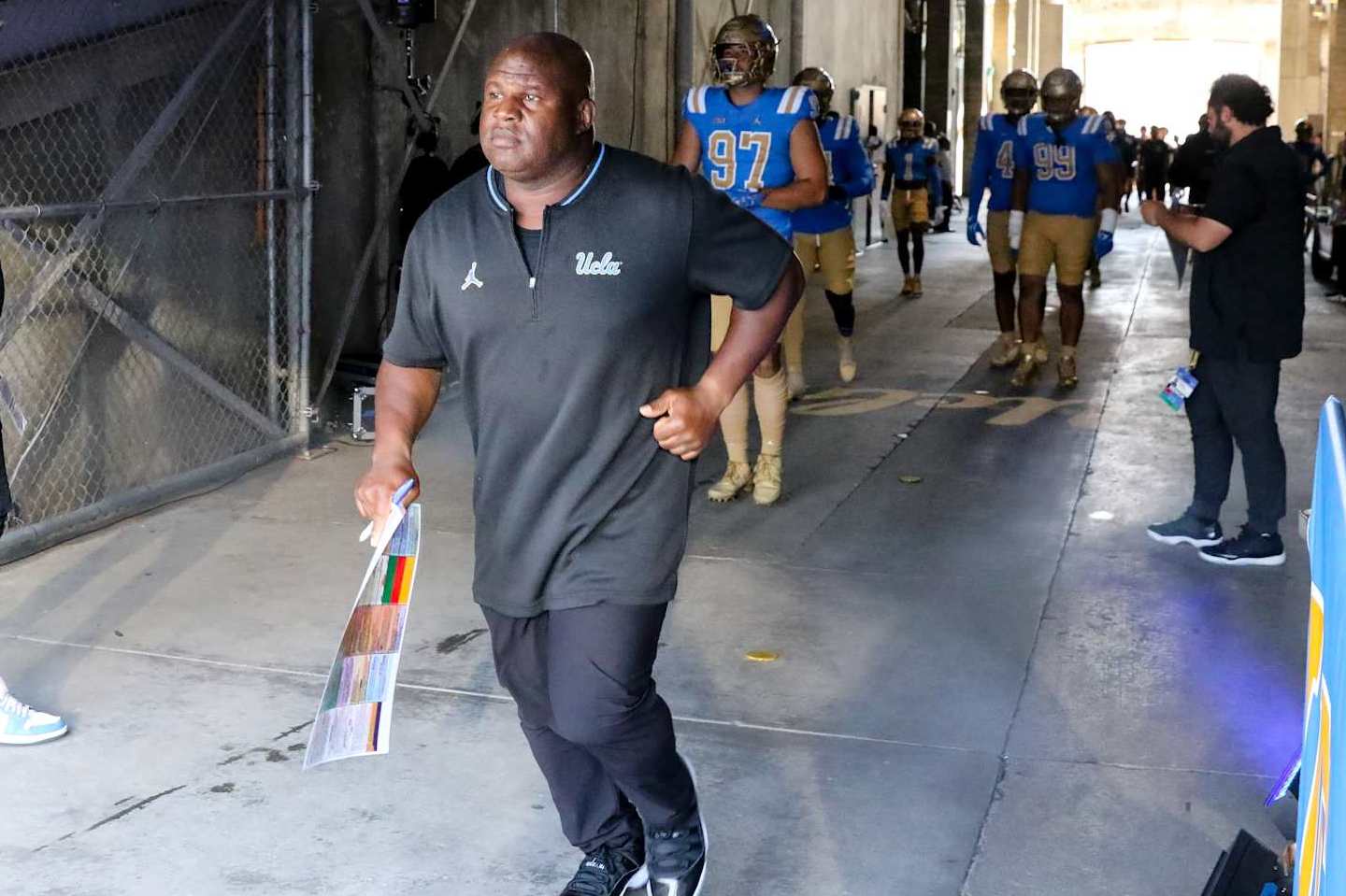 PASADENA, CA - SEPTEMBER 14: UCLA Bruins assistant coach Eric Bieniemy takes the field during the college football game between the Indiana Hoosiers and the UCLA Bruins on September 14, 2024, at the Rose Bowl in Pasadena, CA. (Photo by Jevone Moore/Icon Sportswire via Getty Images)
