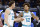 ORLANDO, FLORIDA - OCTOBER 28: Kelly Oubre Jr. #12 and Gordon Hayward #20 of the Charlotte Hornets fist pump prior to the game against the Orlando Magic at Amway Center on October 28, 2022 in Orlando, Florida.  NOTE TO USER: User expressly acknowledges and agrees that, by downloading and or using this photograph, User is consenting to the terms and conditions of the Getty Images License Agreement. (Photo by Douglas P. DeFelice/Getty Images)
