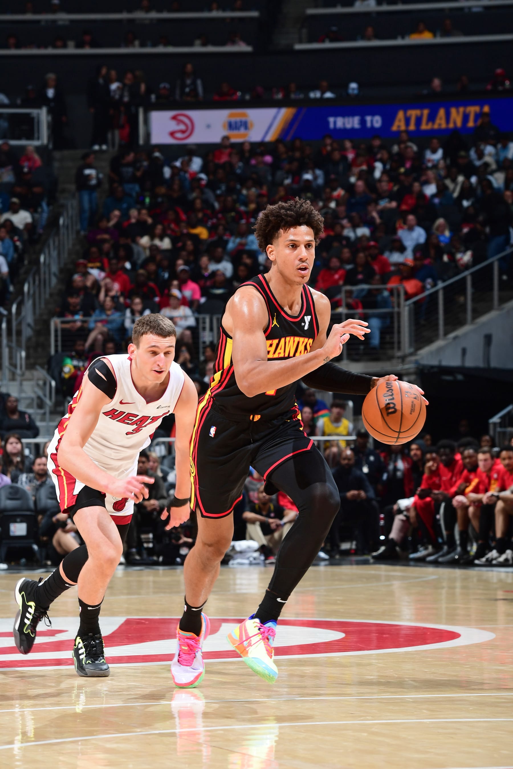 ATLANTA, GA - APRIL 9: Jalen Johnson #1 of the Atlanta Hawks dribbles the ball during the game against the Miami Heat on April 9, 2024 at State Farm Arena in Atlanta, Georgia.  NOTE TO USER: User expressly acknowledges and agrees that, by downloading and/or using this Photograph, user is consenting to the terms and conditions of the Getty Images License Agreement. Mandatory Copyright Notice: Copyright 2024 NBAE (Photo by Scott Cunningham/NBAE via Getty Images)