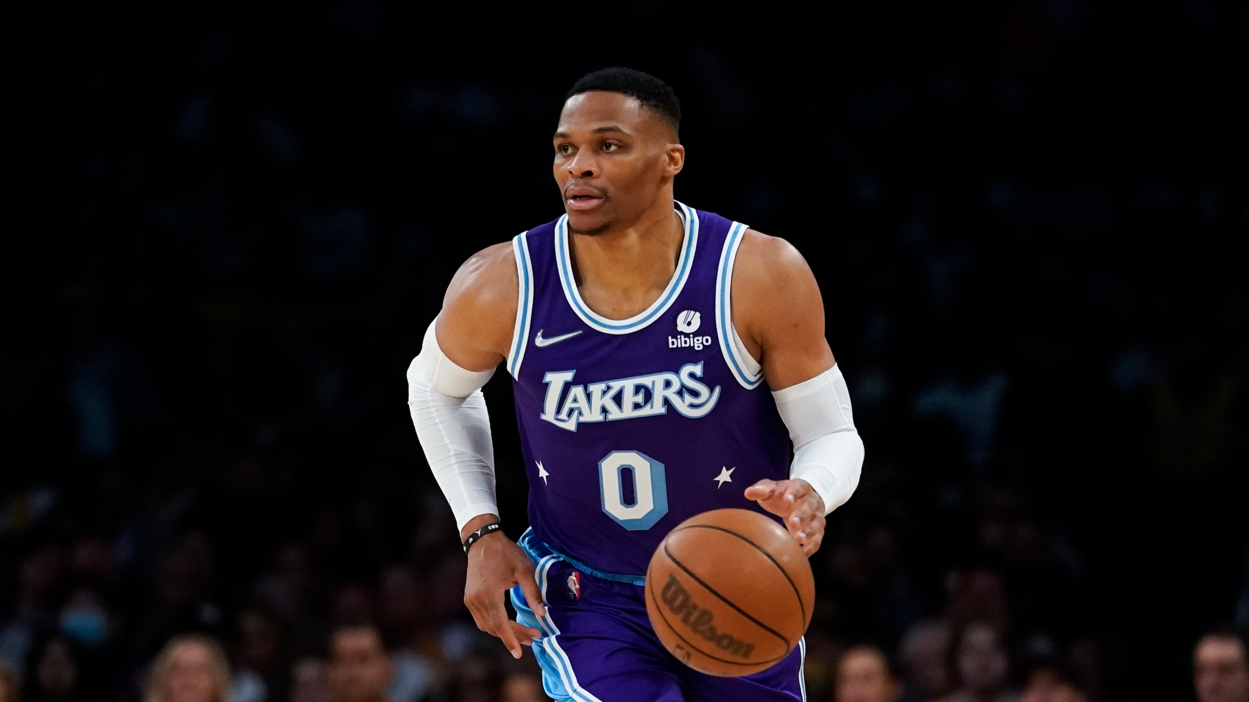 Los Angeles Lakers guard Russell Westbrook (0) controls the ball during an NBA basketball game against the New Orleans Pelicans in Los Angeles, Friday, April 1, 2022. (AP Photo/Ashley Landis)