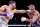 RIYADH, SAUDI ARABIA - FEBRUARY 26: Tommy Fury punches Jake Paul during the Cruiserweight Title fight between Jake Paul and Tommy Fury at the Diriyah Arena on February 26, 2023 in Riyadh, Saudi Arabia. (Photo by Francois Nel/Getty Images)