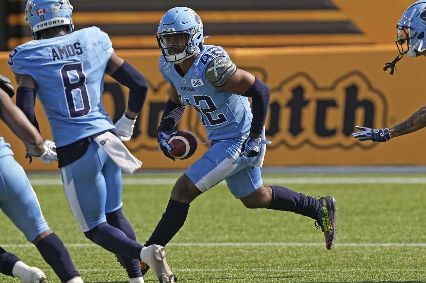 HAMILTON, CANADA - MAY 27: Qwan'tez Stiggers #42 of the Toronto Argonauts returns an interception against the Hamilton Tiger-Cats at Tim Hortons Field on May 27, 2023 in Hamilton, Canada. (Photo by John E. Sokolowski/Getty Images)