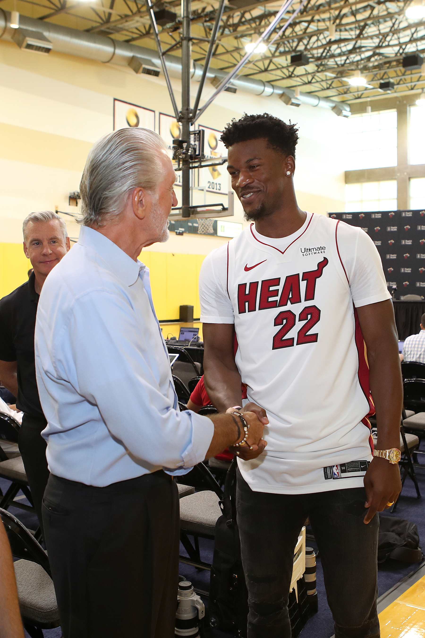 MIAMI, FL - SEPTEMBER 27: Pat Riley and Jimmy Butler #22 of the Miami Heat shake hands after a press conference on September 27, 2019 at American Airlines Arena in Miami, Florida. NOTE TO USER: User expressly acknowledges and agrees that, by downloading and/or using this photograph, user is consenting to the terms and conditions of the Getty Images License Agreement. Mandatory Copyright Notice: Copyright 2019 NBAE (Photo by Issac Baldizon/NBAE via Getty Images)