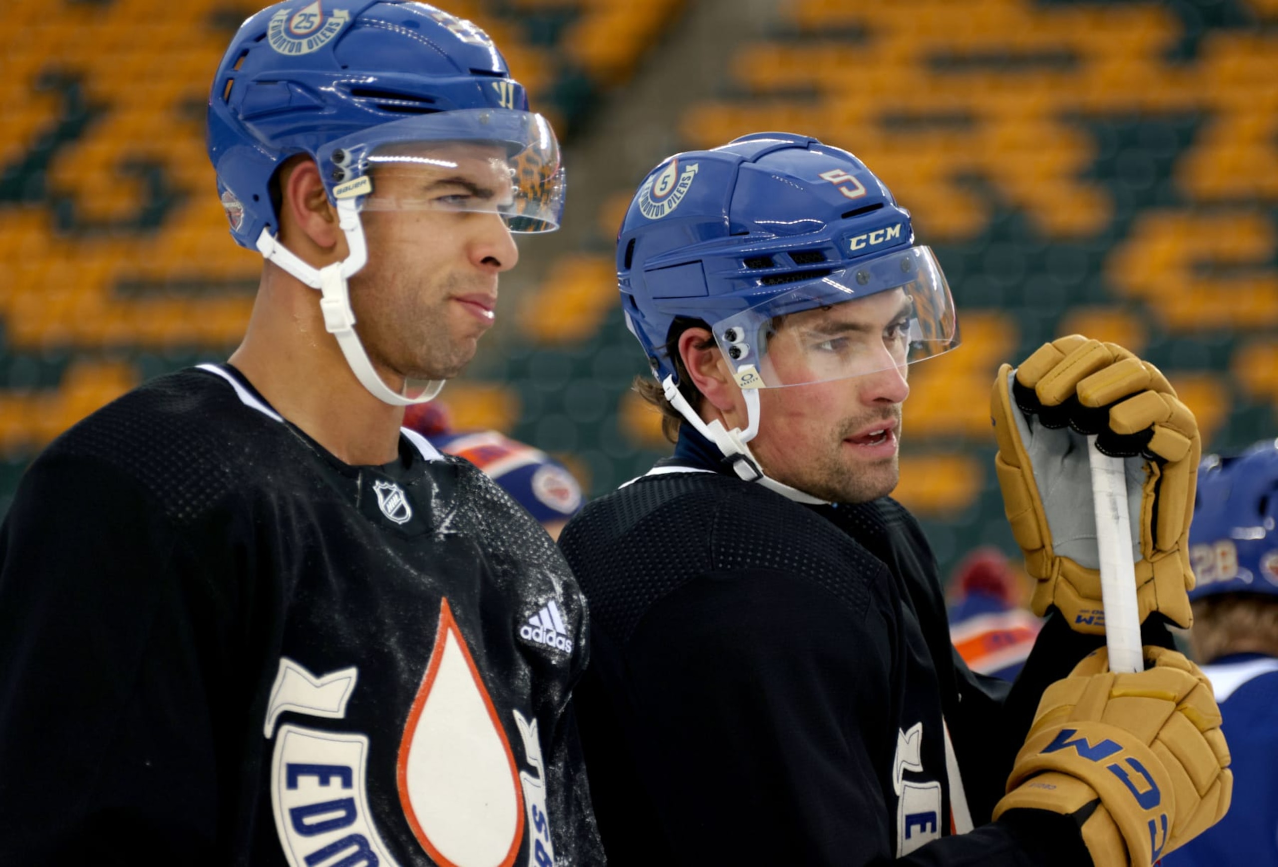 EDMONTON, ALBERTA - OCTOBER 28: (L-R) Darnell Nurse #25 and Cody Ceci #5 of the Edmonton Oilers look on during practice at Commonwealth Stadium on October 28, 2023 in Edmonton, Alberta. (Photo by Dave Sandford/NHLI via Getty Images)