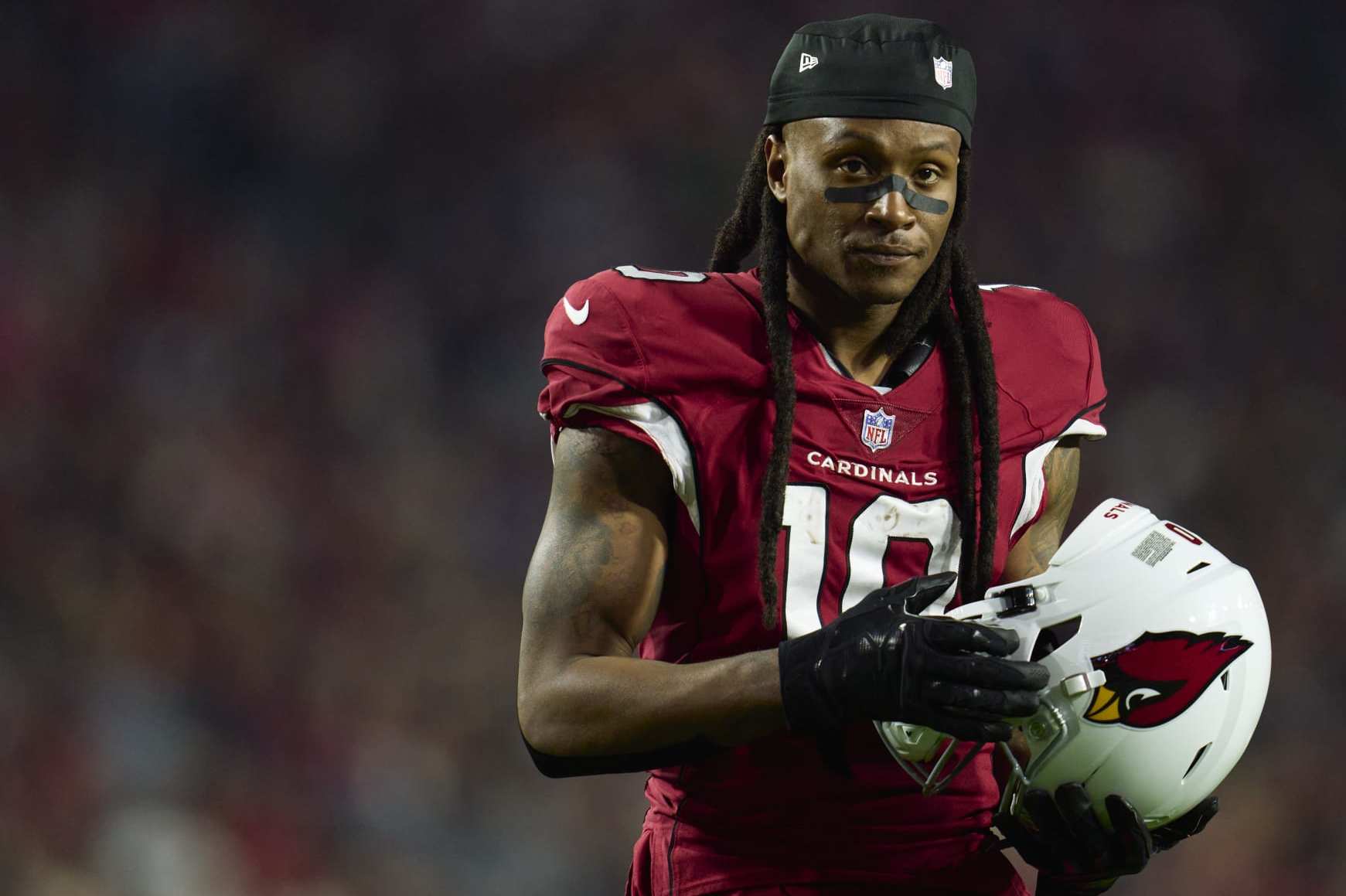 GLENDALE, AZ - DECEMBER 12: DeAndre Hopkins #10 of the Arizona Cardinals looks towards the sideline against the New England Patriots during the second half at State Farm Stadium on December 12, 2022 in Glendale, Arizona. (Photo by Cooper Neill/Getty Images)