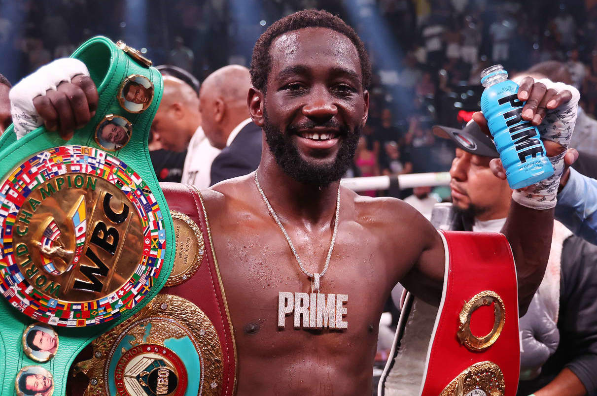 LAS VEGAS, NEVADA - JULY 29: Terence Crawford celebrates with his championship belts after defeating Errol Spence Jr. in the World Welterweight Championship bout at T-Mobile Arena on July 29, 2023 in Las Vegas, Nevada. (Photo by Al Bello/Getty Images)