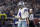 Dallas Cowboys quarterback Dak Prescott (4) celebrates after throwing a touchdown pass to tight end Dalton Schultz in the first half of an NFL football game against the Washington Football Team in Arlington, Texas, Sunday, Dec. 26, 2021. (AP Photo/Ron Jenkins)