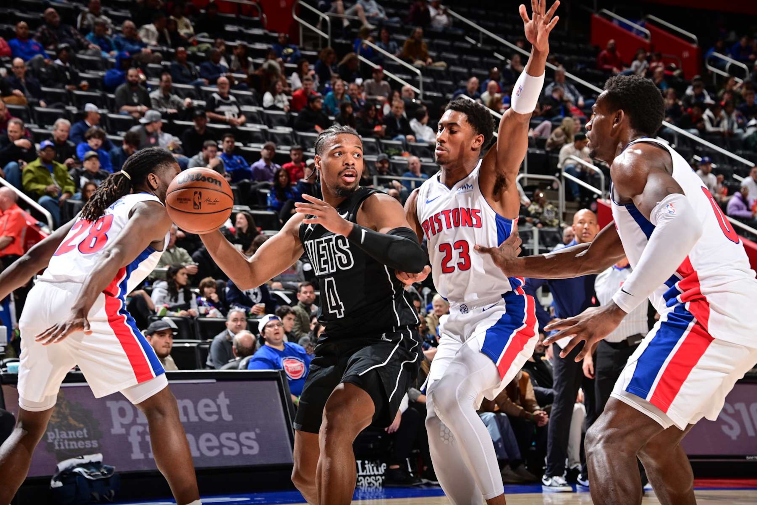 DETROIT, MI - MARCH 7: Dennis Smith Jr. #4 of the Brooklyn Nets handles the ball during the game against the Detroit Pistons on March 7, 2024 at Little Caesars Arena in Detroit, Michigan. NOTE TO USER: User expressly acknowledges and agrees that, by downloading and/or using this photograph, User is consenting to the terms and conditions of the Getty Images License Agreement. Mandatory Copyright Notice: Copyright 2024 NBAE (Photo by Chris Schwegler/NBAE via Getty Images)