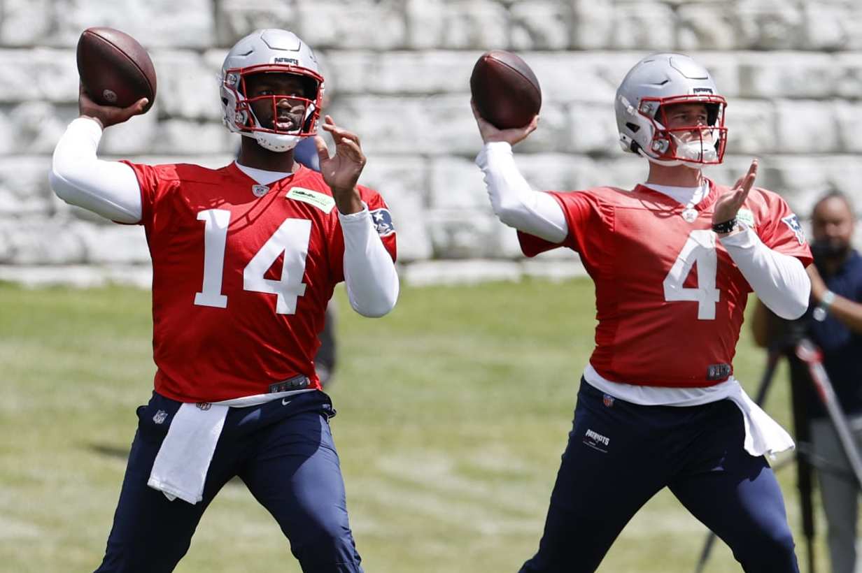 New England Patriots quarterbacks Jacoby Brissett (left) and Drake Maye (right)