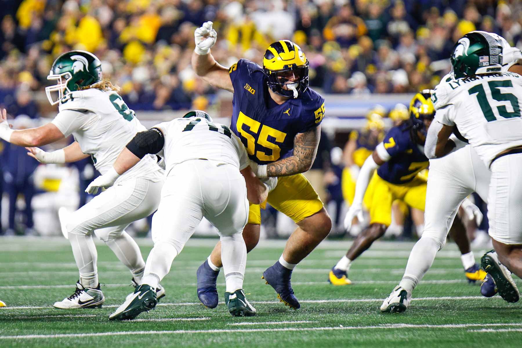 ANN ARBOR, MI - OCTOBER 26: Mason Graham #55 of Michigan gets past his blocker during a game between Michigan State University and University of Michigan at Michigan Stadium on October 26, 2024 in Ann Arbor, Michigan. (Photo by Michael Miller/ISI Photos/Getty Images)