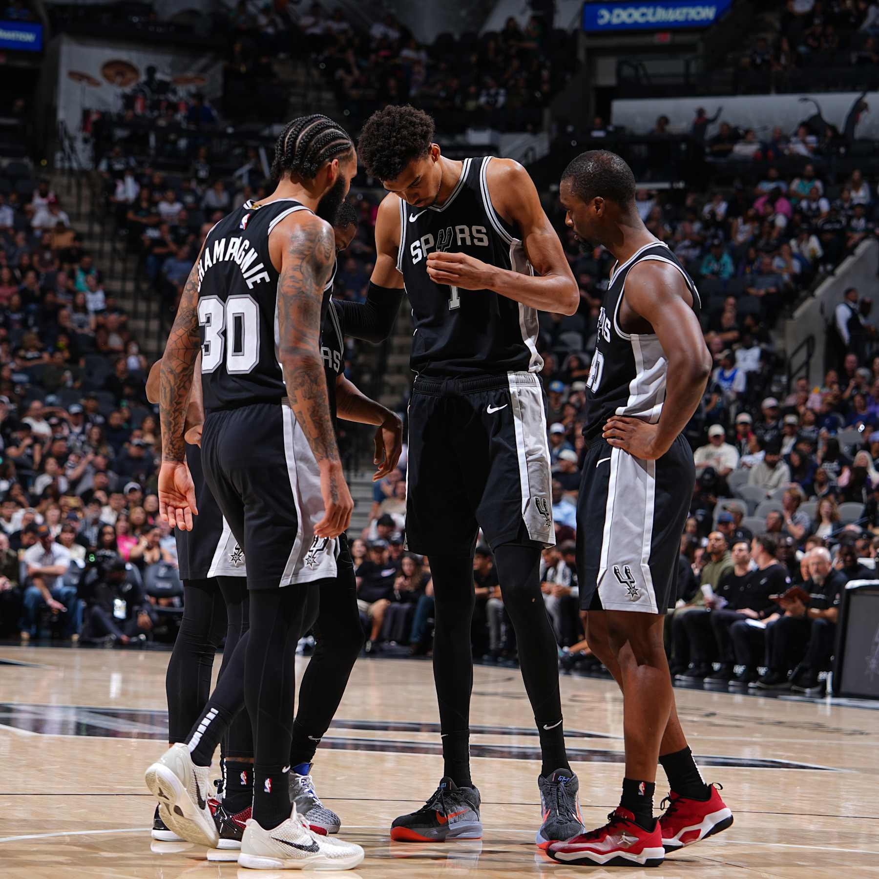 SAN ANTONIO, TX - NOVEMBER 13: San Antonio Spurs huddle up during the game against the Washington Wizards on November 13, 2024 at the Frost Bank Center in San Antonio, Texas. NOTE TO USER: User expressly acknowledges and agrees that, by downloading and or using this photograph, user is consenting to the terms and conditions of the Getty Images License Agreement. Mandatory Copyright Notice: Copyright 2024 NBAE (Photos byGarrett Ellwood/NBAE via Getty Images)