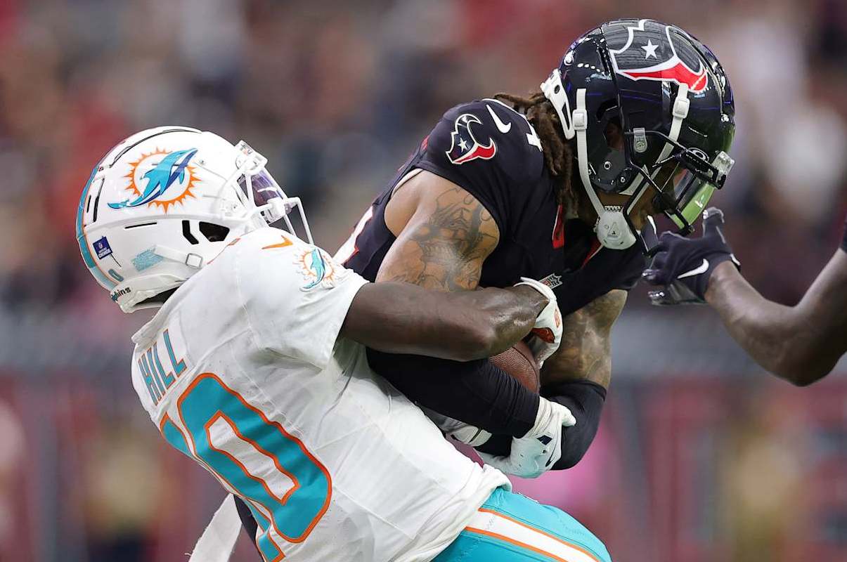 Houston Texans cornerback Derek Stingley Jr. steals and interception from Miami Dolphins wide receiver Tyreek Hill. Houston Texans cornerback Derek Stingley Jr. steals and interception from Miami Dolphins wide receiver Tyreek Hill.