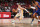 LAS VEGAS, NV - AUGUST 11: Mac McClung #20 of the Los Angeles Lakers dribbles during the game against the New York Knicks during the 2021 Las Vegas Summer League on August 11, 2021 at the Thomas & Mack Center in Las Vegas, Nevada. NOTE TO USER: User expressly acknowledges and agrees that, by downloading and/or using this Photograph, user is consenting to the terms and conditions of the Getty Images License Agreement. Mandatory Copyright Notice: Copyright 2021 NBAE (Photo by Garrett Ellwood/NBAE via Getty Images)