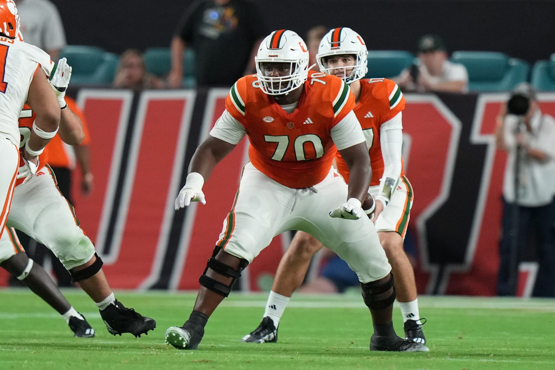 MIAMI GARDENS, FL - OCTOBER 21: Miami Hurricanes offensive lineman Javion Cohen (70) protects the passer during the game between the Clemson Tigers and the Miami Hurricanes on Saturday, October 21, 2023 at Hard Rock Stadium, Miami Gardens, Fla. (Photo by Peter Joneleit/Icon Sportswire via Getty Images)