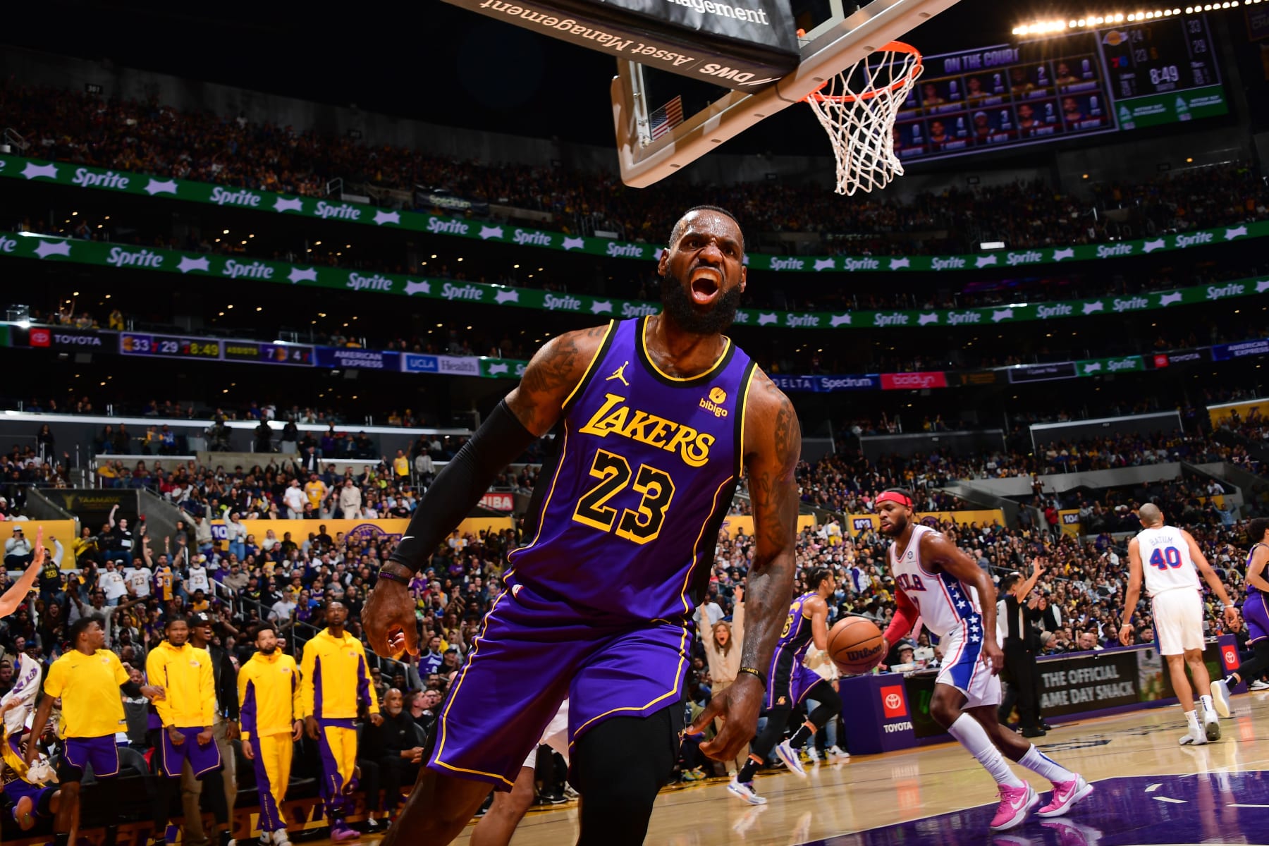 LOS ANGELES, CA - MARCH 22: LeBron James #23 of the Los Angeles Lakers celebrates during the game against the Philadelphia 76ers on March 22, 2024 at Crypto.Com Arena in Los Angeles, California. NOTE TO USER: User expressly acknowledges and agrees that, by downloading and/or using this Photograph, user is consenting to the terms and conditions of the Getty Images License Agreement. Mandatory Copyright Notice: Copyright 2024 NBAE (Photo by Adam Pantozzi/NBAE via Getty Images)