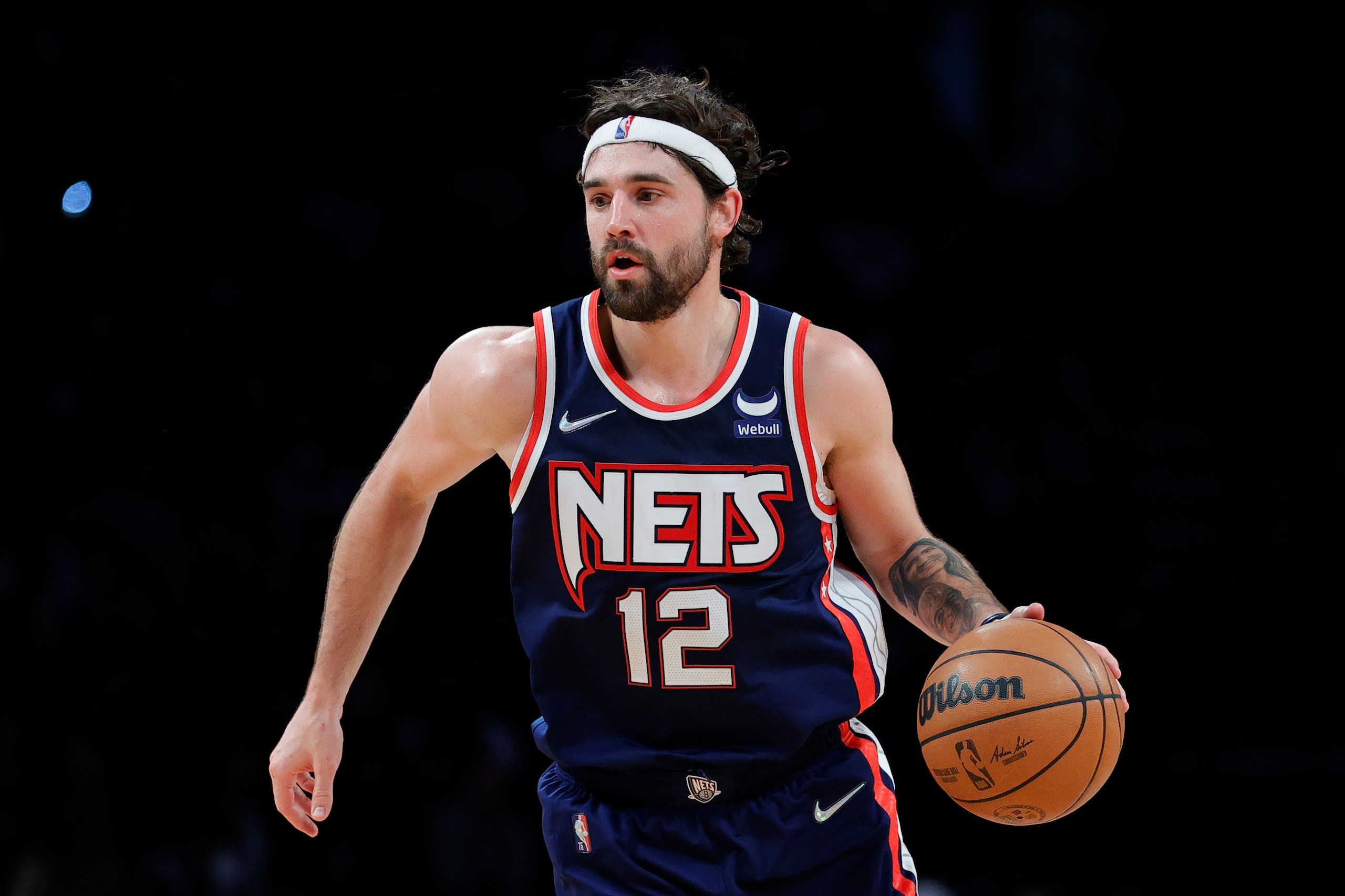 NEW YORK, NEW YORK - NOVEMBER 03: Joe Harris #12 of the Brooklyn Nets dribbles during the second half against the Atlanta Hawks at Barclays Center on November 03, 2021 in the Brooklyn borough of New York City. NOTE TO USER: User expressly acknowledges and agrees that, by downloading and or using this photograph, user is consenting to the terms and conditions of the Getty Images License Agreement. (Photo by Sarah Stier/Getty Images) NEW YORK, NEW YORK - NOVEMBER 03: Joe Harris #12 of the Brooklyn Nets dribbles during the second half against the Atlanta Hawks at Barclays Center on November 03, 2021 in the Brooklyn borough of New York City. NOTE TO USER: User expressly acknowledges and agrees that, by downloading and or using this photograph, user is consenting to the terms and conditions of the Getty Images License Agreement. (Photo by Sarah Stier/Getty Images)