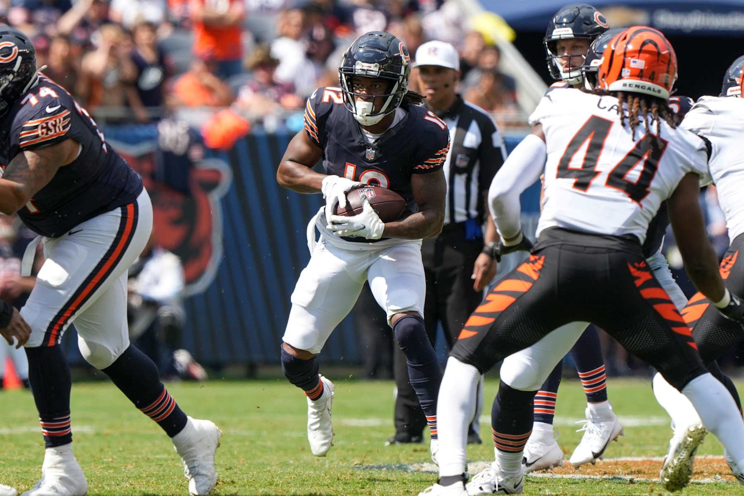 CHICAGO, IN - AUGUST 17: Velus Jones Jr. #12 of the Chicago Bears runs downfield with the ball during the fourth quarter of an NFL preseason football game against the Cincinnati Bengals, at Soldier Field on August 17, 2024 in Chicago, Illinois. (Photo by Todd Rosenberg/Getty Images) CHICAGO, IN - AUGUST 17: Velus Jones Jr. #12 of the Chicago Bears runs downfield with the ball during the fourth quarter of an NFL preseason football game against the Cincinnati Bengals, at Soldier Field on August 17, 2024 in Chicago, Illinois. (Photo by Todd Rosenberg/Getty Images)