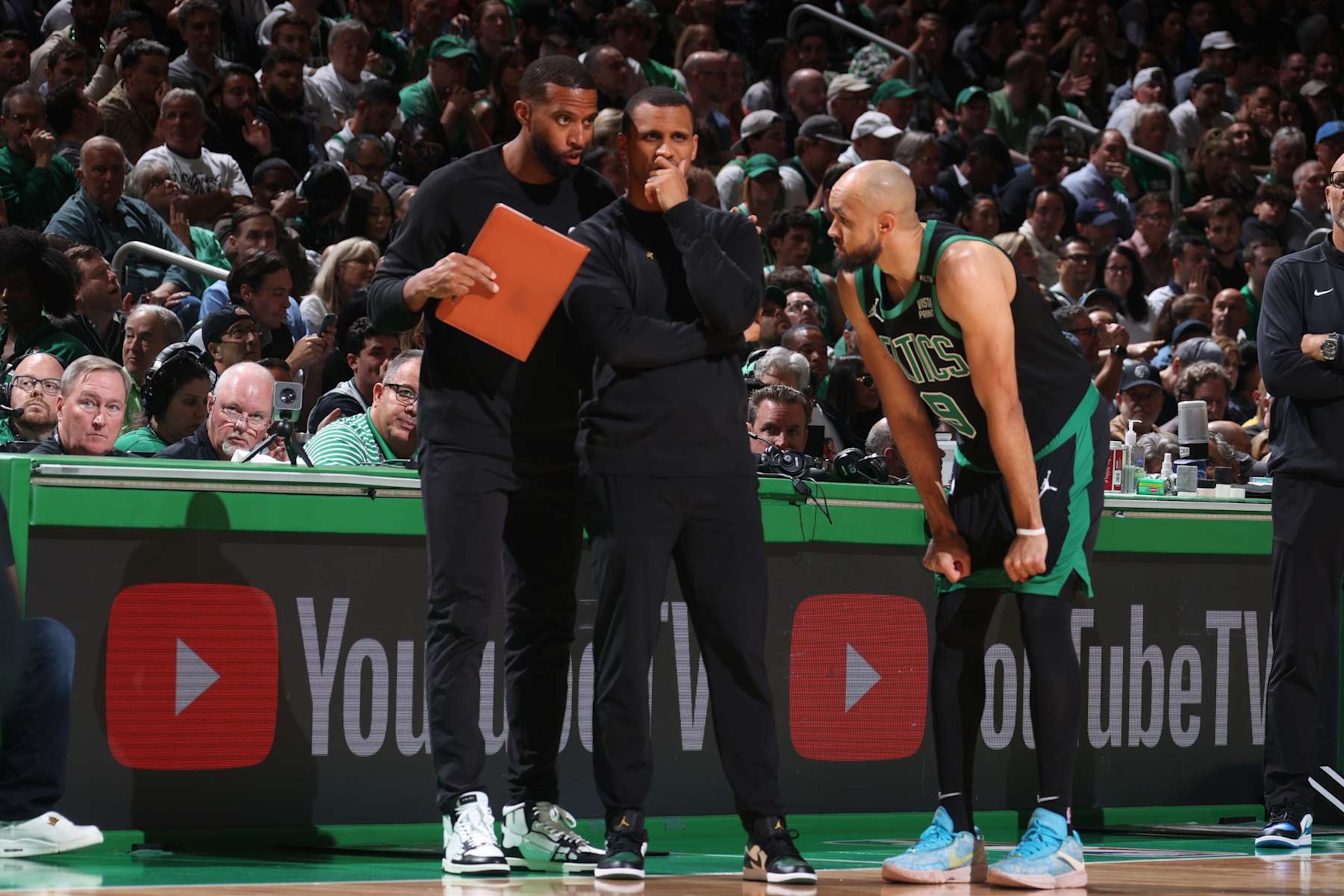 BOSTON, MA - JUNE 9: Head Coach Joe Mazzulla and Charles Lee talk to Derrick White #9 of the Boston Celtics during the game against the Dallas Mavericks during Game 1 of the 2024 NBA Finals on June 9, 2024 at the TD Garden in Boston, Massachusetts. NOTE TO USER: User expressly acknowledges and agrees that, by downloading and or using this photograph, User is consenting to the terms and conditions of the Getty Images License Agreement. Mandatory Copyright Notice: Copyright 2024 NBAE  (Photo by Nathaniel S. Butler/NBAE via Getty Images)