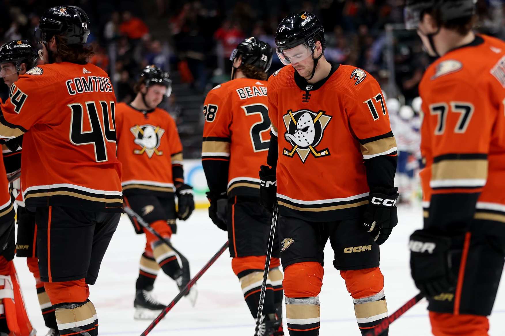 ANAHEIM, CALIFORNIA - APRIL 05: Scott Harrington #17, Max Comtois #44, Frank Vatrano #77 and Nathan Beaulieu #28 of the Anaheim Ducks look on after being defeated by the Edmonton Oilers 3-1 in a game at Honda Center on April 05, 2023 in Anaheim, California. (Photo by Sean M. Haffey/Getty Images)
