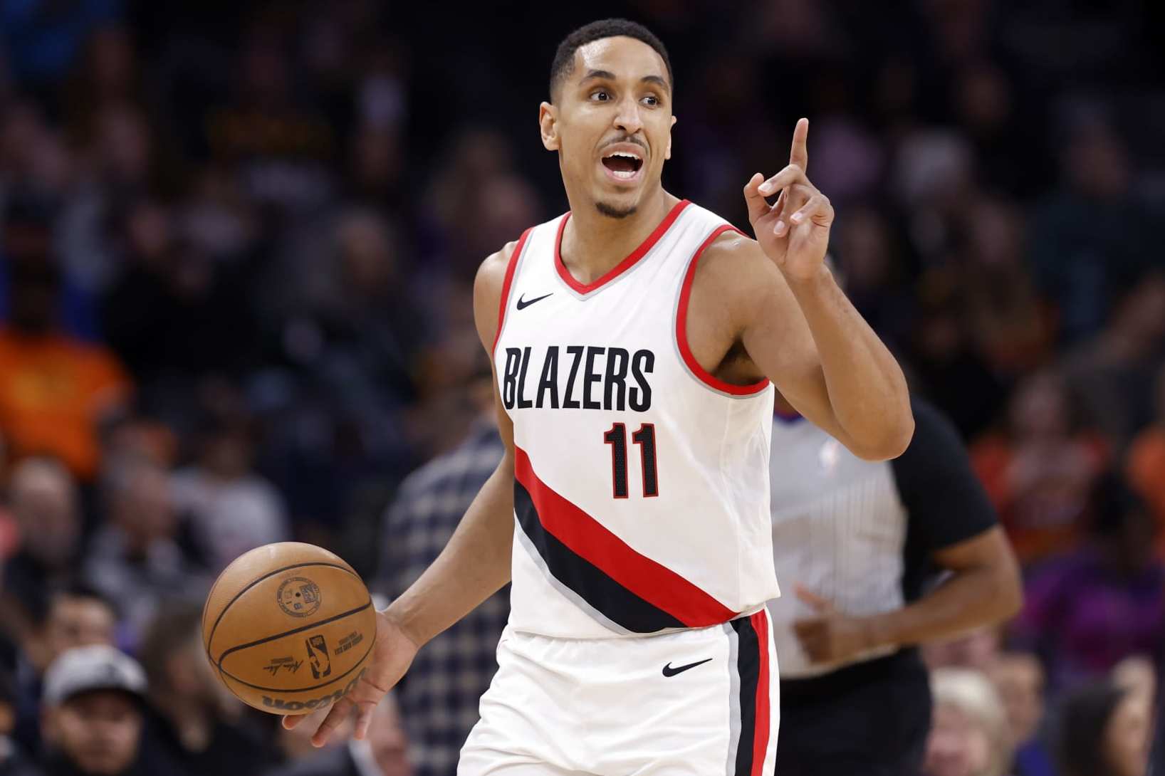 PHOENIX, ARIZONA - JANUARY 01: Malcolm Brogdon #11 of the Portland Trail Blazers in action during the game against the Phoenix Suns at Footprint Center on January 01, 2024 in Phoenix, Arizona. The Suns defeated the Trail Blazers 109-88. NOTE TO USER: User expressly acknowledges and agrees that, by downloading and or using this photograph, User is consenting to the terms and conditions of the Getty Images License Agreement. (Photo by Chris Coduto/Getty Images)