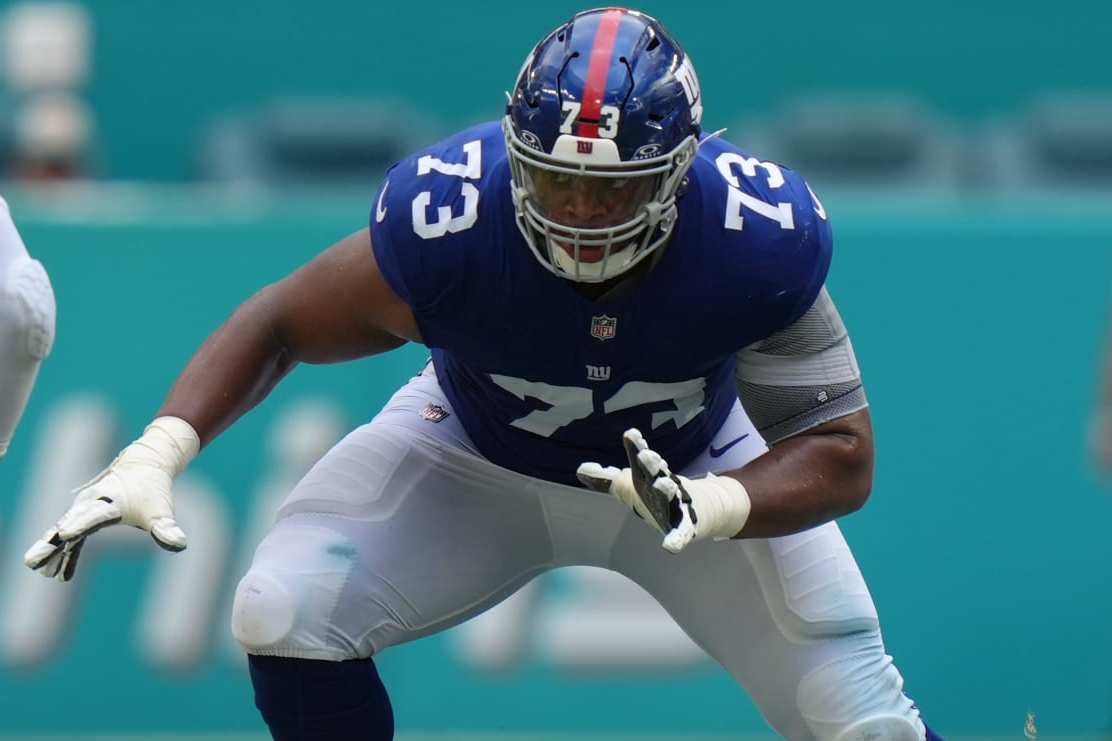 MIAMI GARDENS, FL - OCTOBER 08: New York Giants offensive tackle Evan Neal (73) looks to make a block during the game between the New York Giants and the Miami Dolphins on Sunday, October 8, 2023 at Hard Rock Stadium, Miami Gardens, Fla. (Photo by Peter Joneleit/Icon Sportswire via Getty Images)