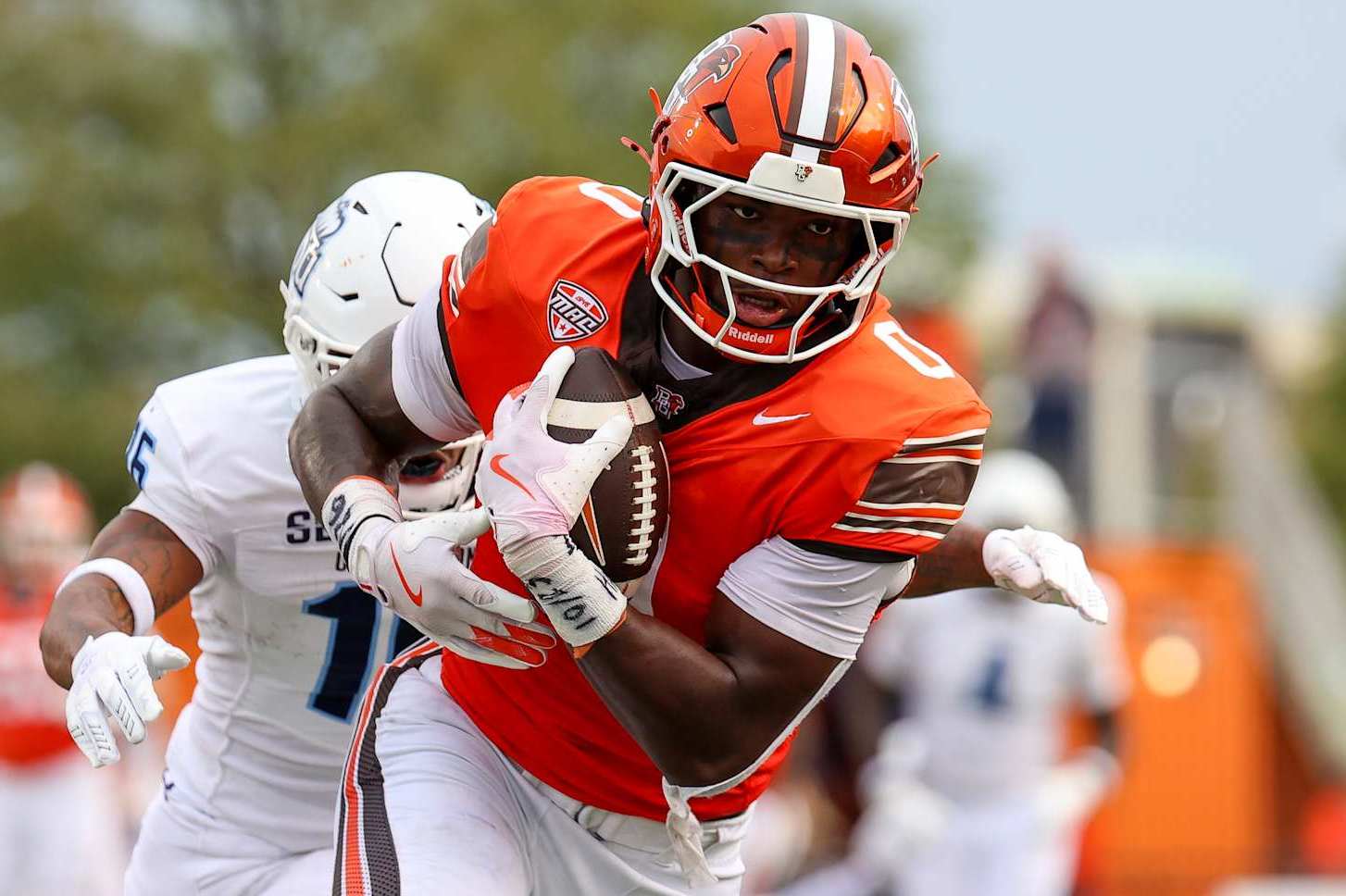 BOWLING GREEN, OHIO - SEPTEMBER 28: Harold Fannin Jr. #0 of the Bowling Green Falcons catches the ball against Khian'Dre Harris #16 of the Old Dominion Monarchs at Doyt Perry Stadium on September 28, 2024 in Bowling Green, Ohio. (Photo by Isaiah Vazquez/Getty Images)